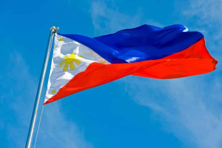 Philippines Flag in Front of a Blue Sky